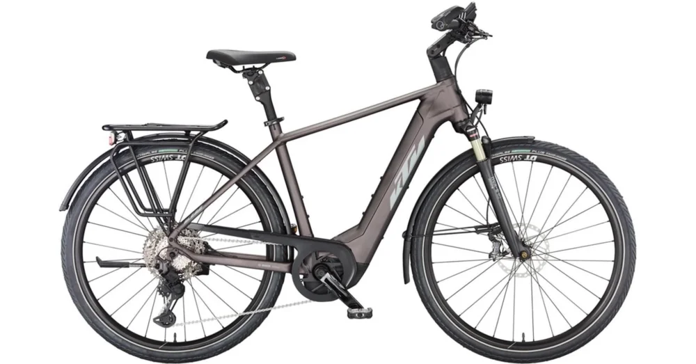 Legkelendőbb KTM MACINA STYLE 710 ELDERBERRY MATT(GREY+ORANGE) 2023 FÉRFI ELEKTROMOS TREKKING KERÉKPÁR
