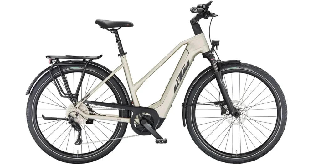 KTM MACINA STYLE 740 CHAMPAGNE MATT(BLACK+ORANGE) TRAPÉZ 2023 NŐI ELEKTROMOS TREKKING KERÉKPÁR Ingyenes szállítás