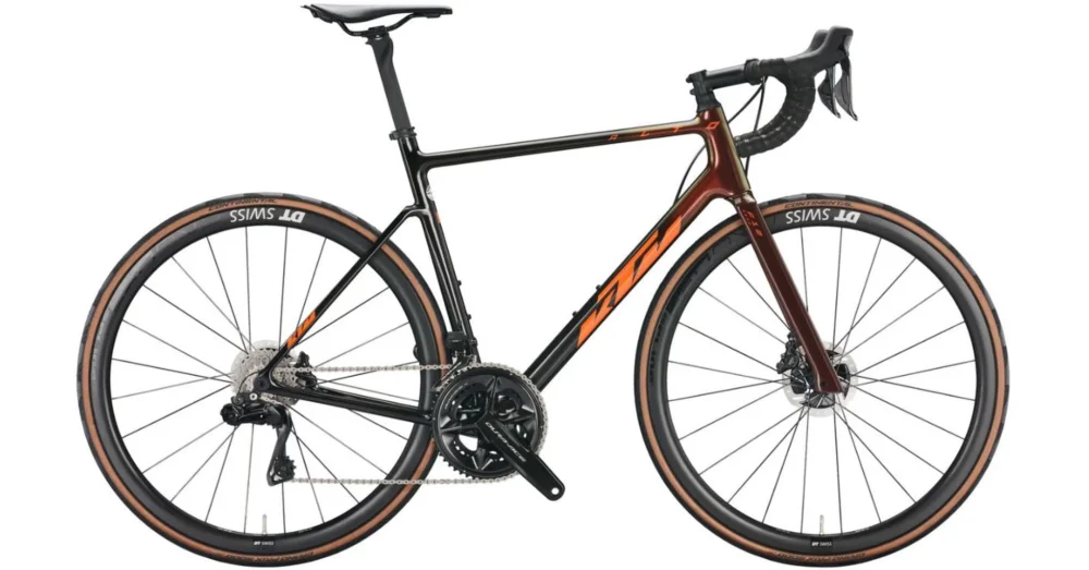 KTM REVELATOR ALTO EXONIC CARBON (SUNSET+ORANGE) 2022 FÉRFI ORSZÁGÚTI KERÉKPÁR - 52 CM Legkelendőbb
