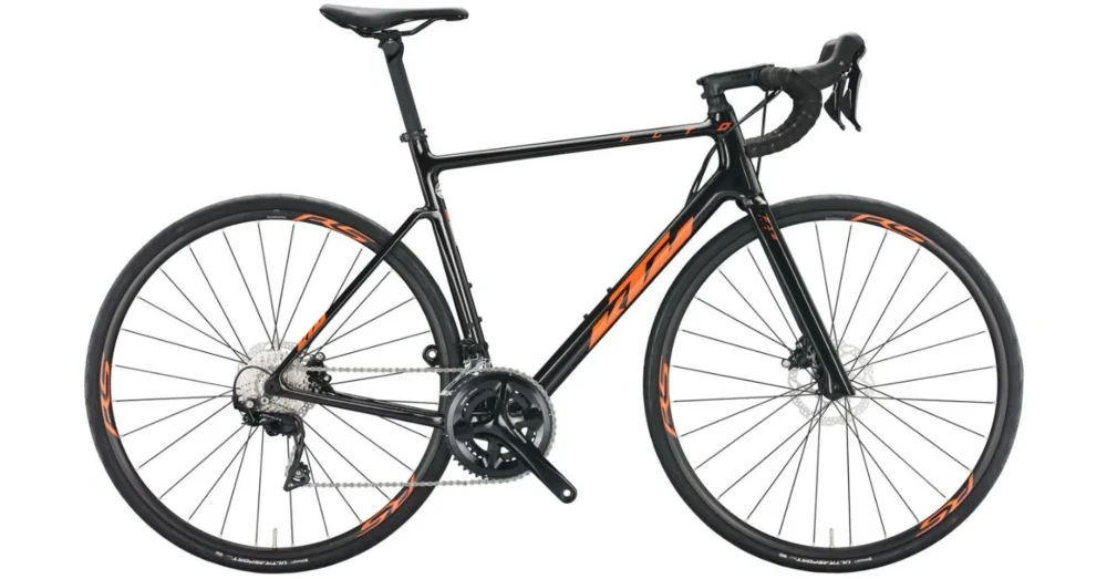 Szezonális akció KTM REVELATOR ALTO PRO FLAMING BLACK (ORANGE) 2022 FÉRFI ORSZÁGÚTI KERÉKPÁR