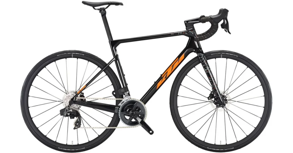 Különleges ajánlat KTM REVELATOR ALTO ELITE AXS CARBON (ORANGE+GREY) 2023 FÉRFI ORSZÁGÚTI KERÉKPÁR