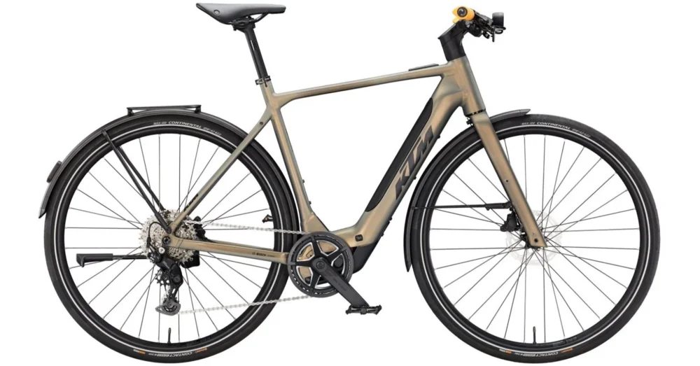 Gyors szállítás KTM MACINA URBANATOR SX OLIVE PEARL MATT (BLACK+AMBER) 2025 FÉRFI ELEKTROMOS GRAVEL KERÉKPÁR